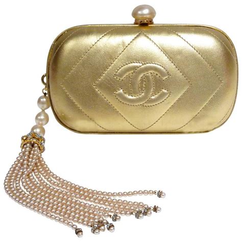 white and gold chanel purse|chanel gold clutch.